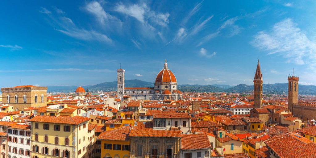 Aerial scenic panorama of Duomo Santa Maria Del Fiore, Badia Fiorentina and Bargello at morning from Palazzo Vecchio in Florence, Tuscany, Italy