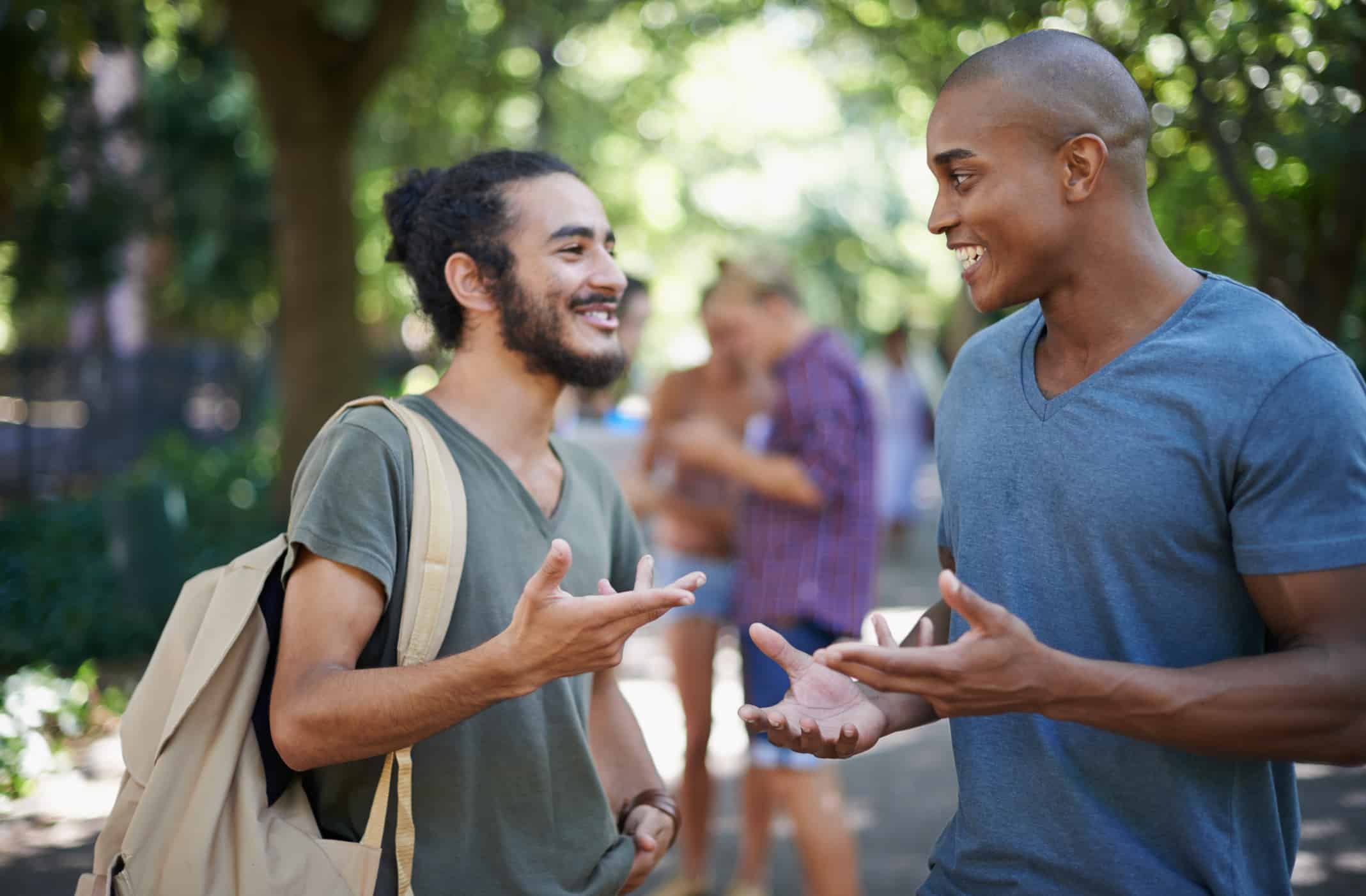 Shot of a group of college students hanging out on campus